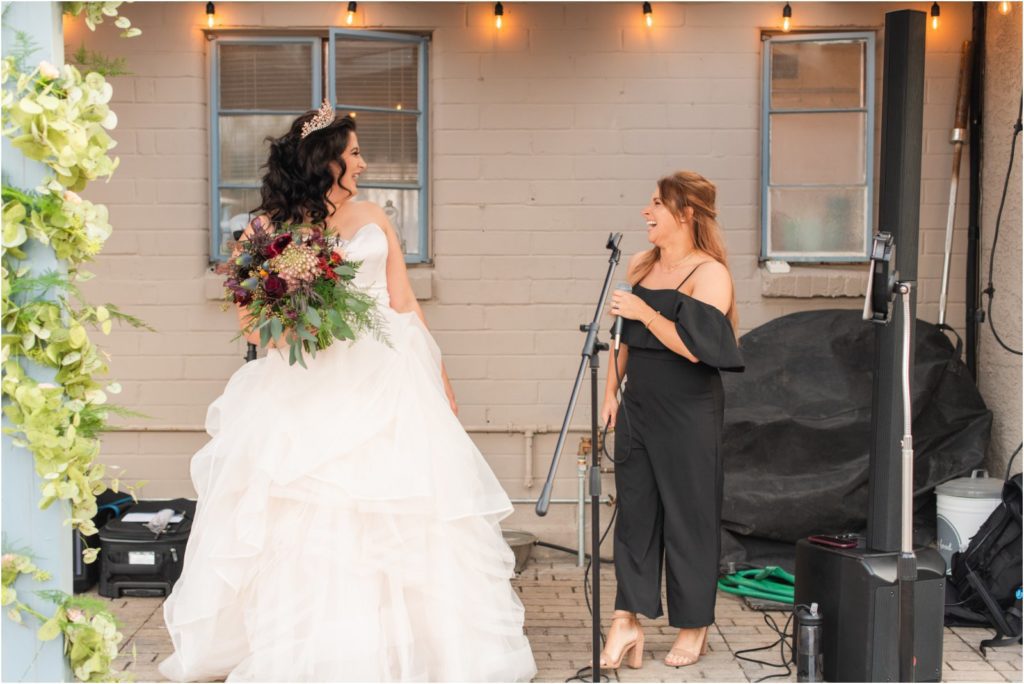 wedding singer singing with bride