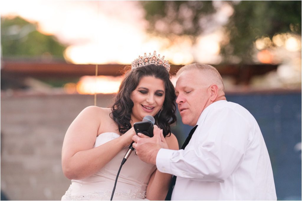 bride and groom singing together at vow renewal in Tucson