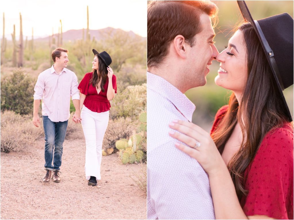 Engaged couple walking and kissing in desert in Tucson Mountain Park
