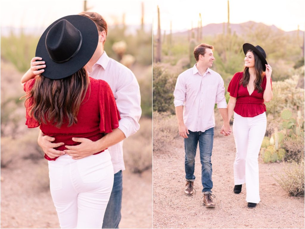 Engaged couple holding each other in desert