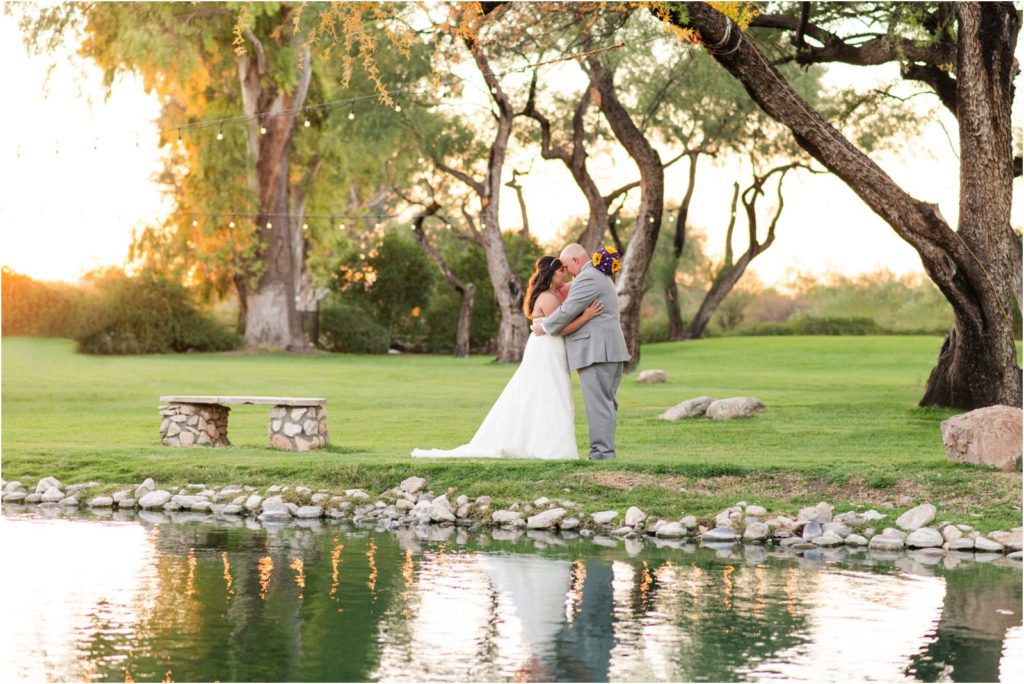 Bride and Groom portrait by pond at La Mariposa in Tucson wedding photographer Christy Hunter Photography