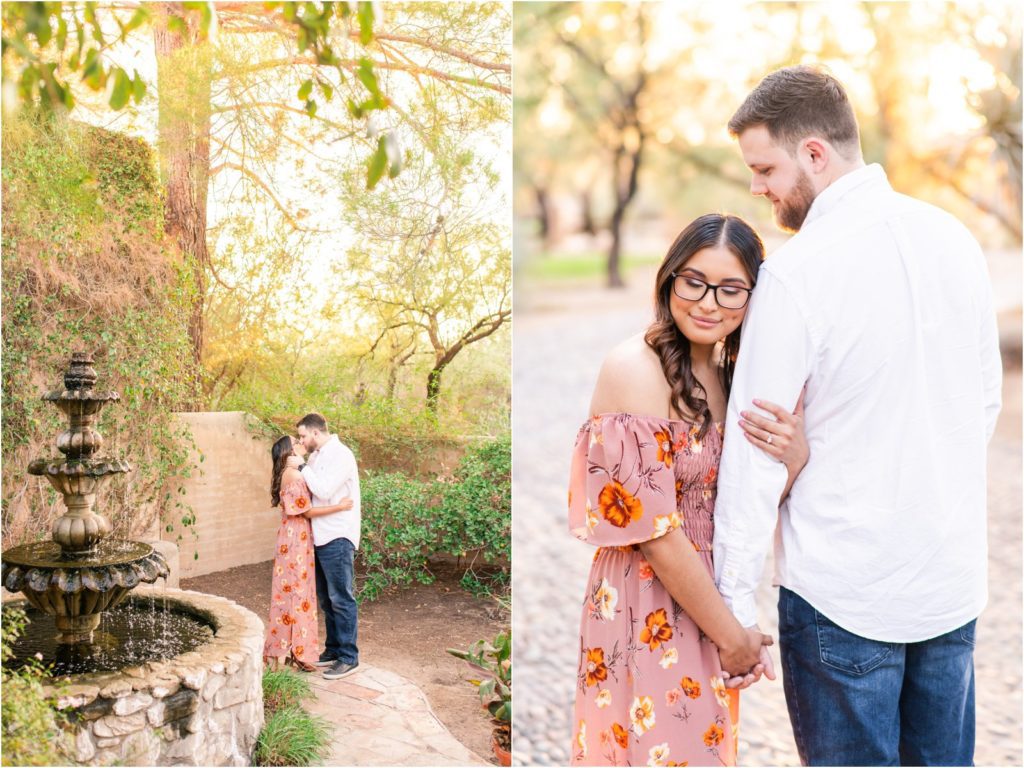 engaged couple kissing by fountain surrounded by green in Tucson engagement session