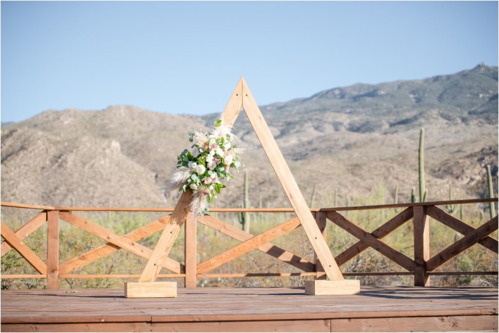 ceremony arch with floral accent