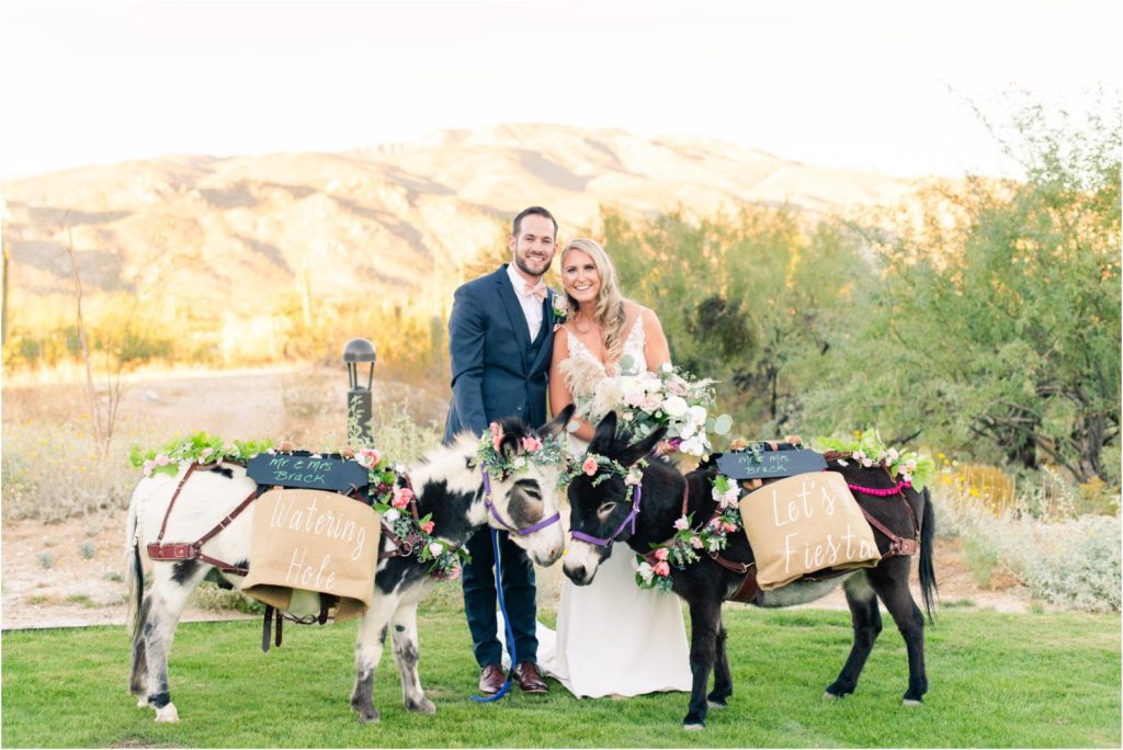 wedding couple with two beer burros during cocktail hour
