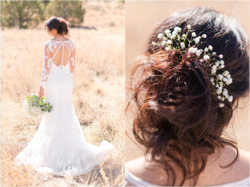 back of bride's lace wedding dress and simple wedding hairstyle