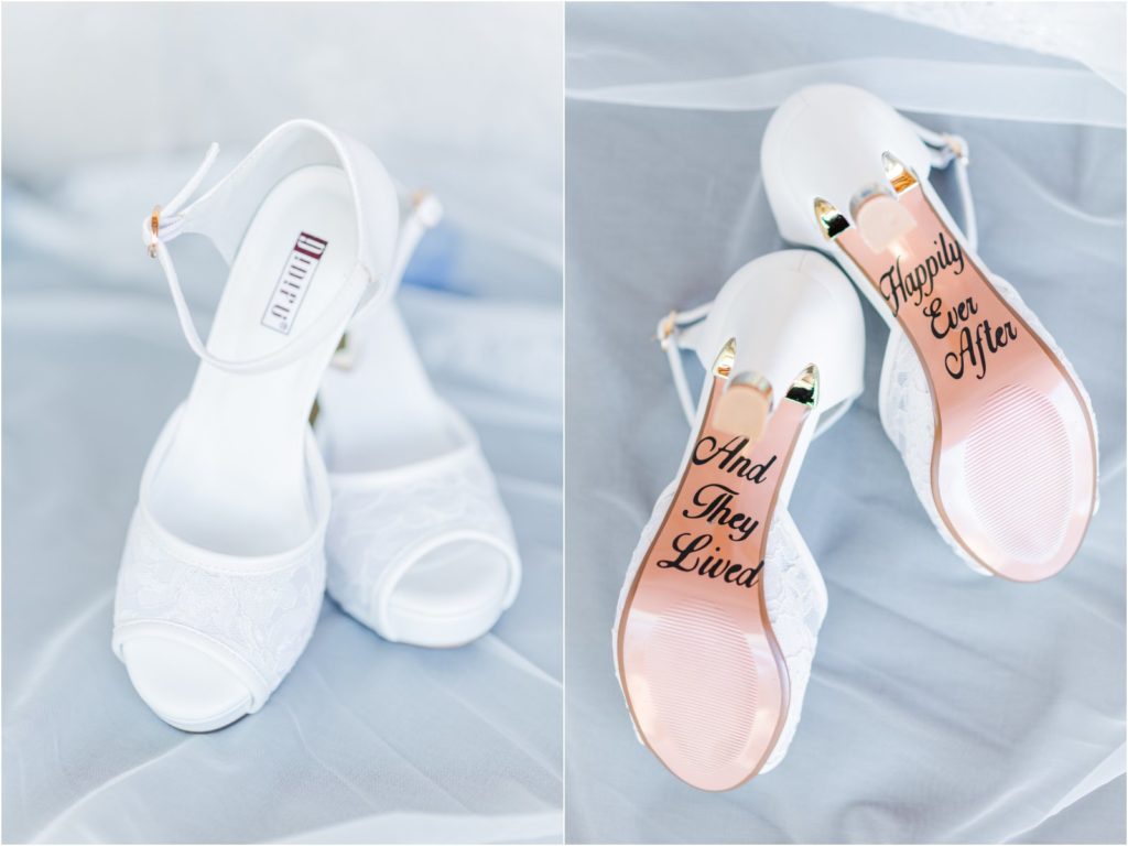 bride's shoes with writing on the bottom