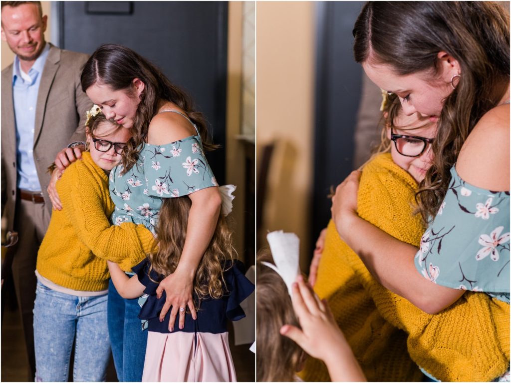 daughters hugging girlfriend after surprise marriage proposal