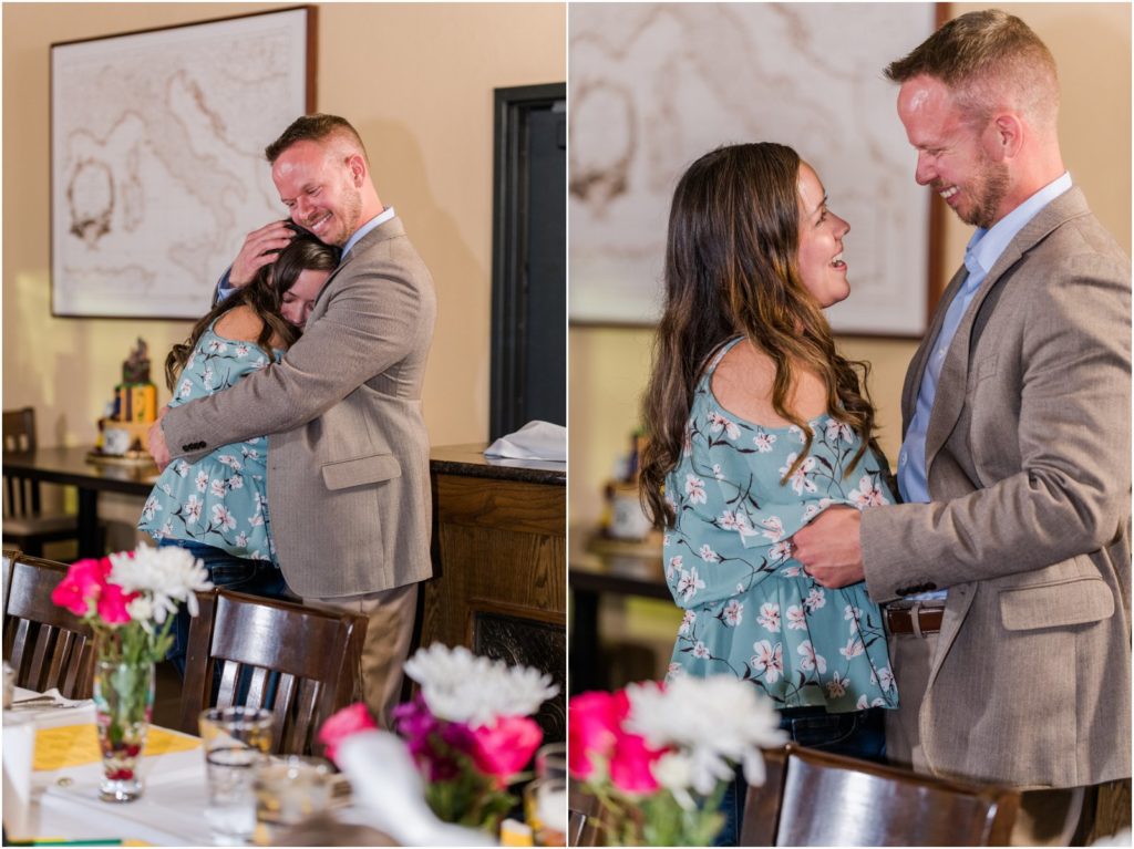 newly engaged couple smiling and hugging after surprise proposal
