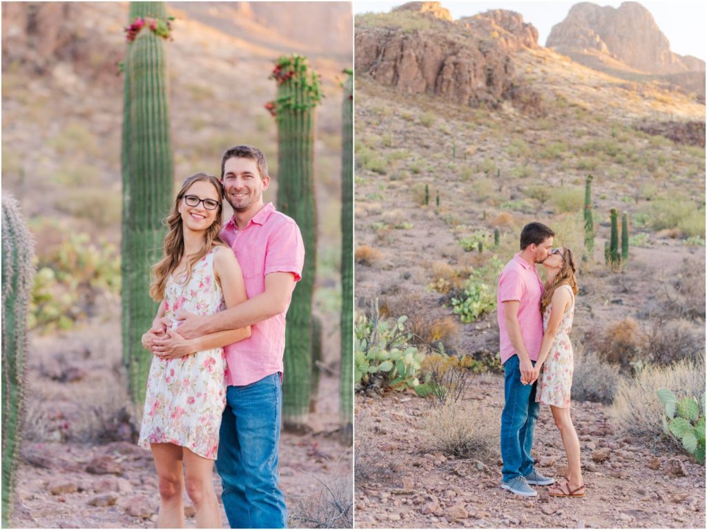 engaged couple kissing in desert by blooming cacti in Tucson desert