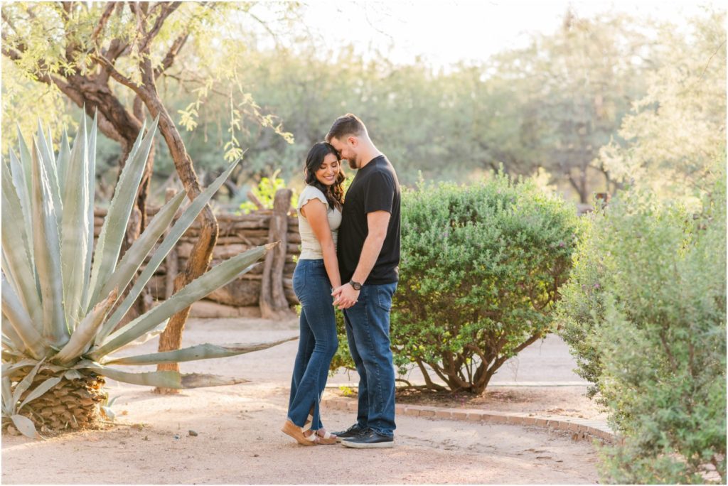 engaged couple at ranch estate home by large agave