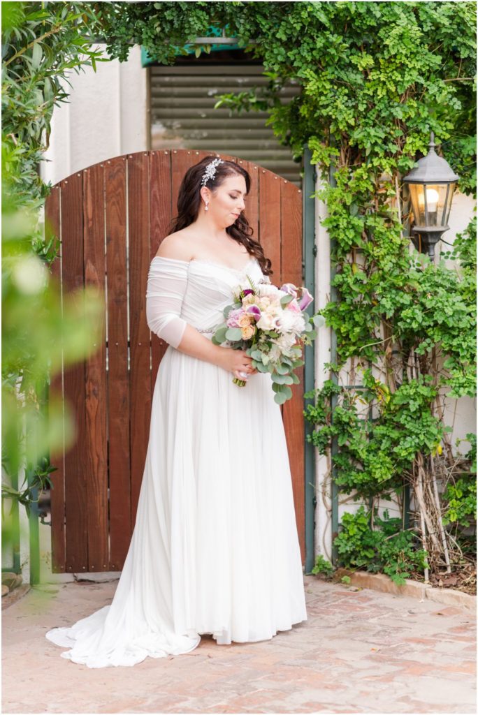 bridal portraits in courtyard at the Stillwell House by Christy Hunter Photography