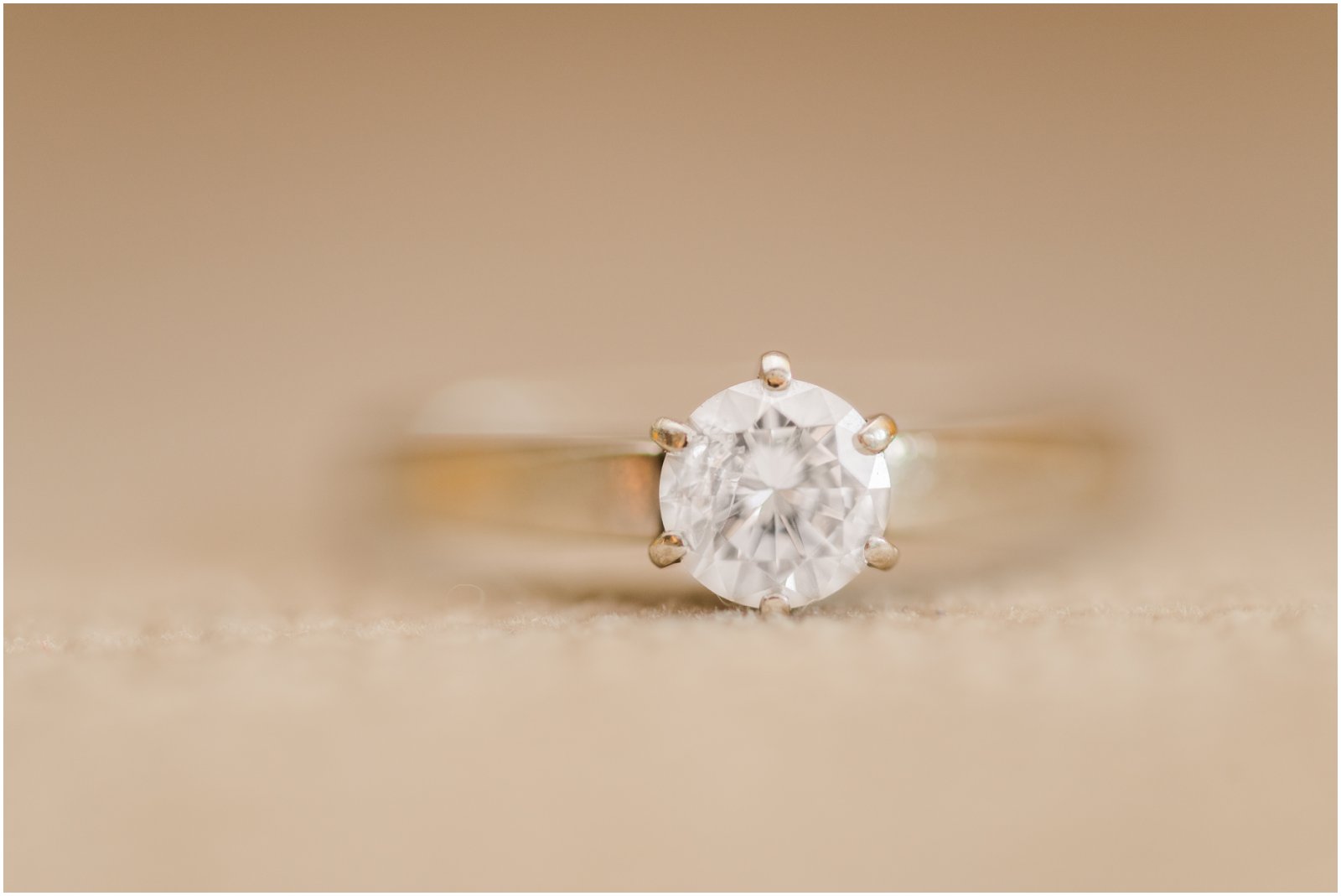 engagement ring closeup during indoor engagement session in Bisbee