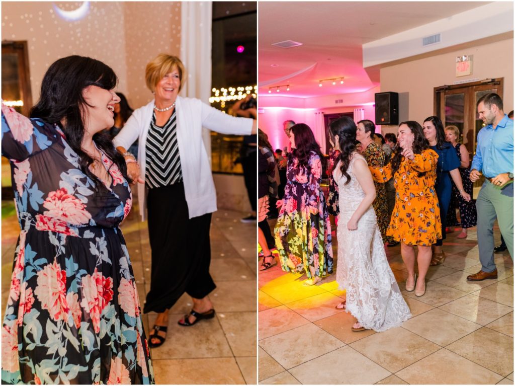 bride dancing with guests during wedding reception