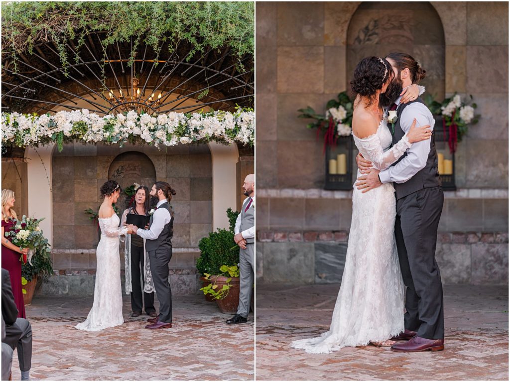 bride and groom's first kiss at the altar during courtyard ceremony at the Stillwell House