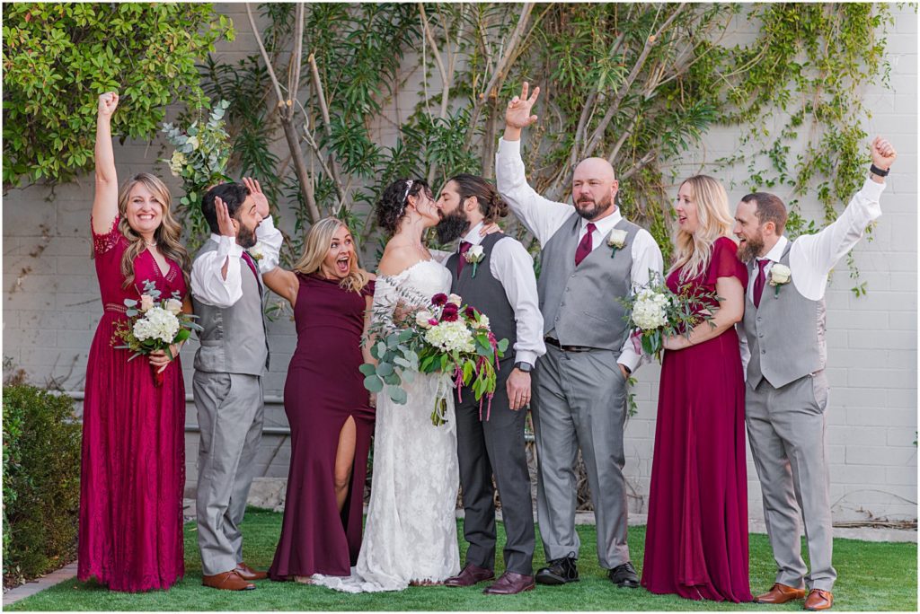 bridal party in gray and burgundy for winter wedding at the Stillwell House and Gardens