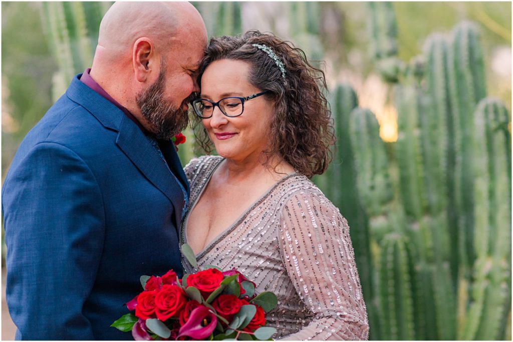 portrait of bride and groom with organ pipe cactus