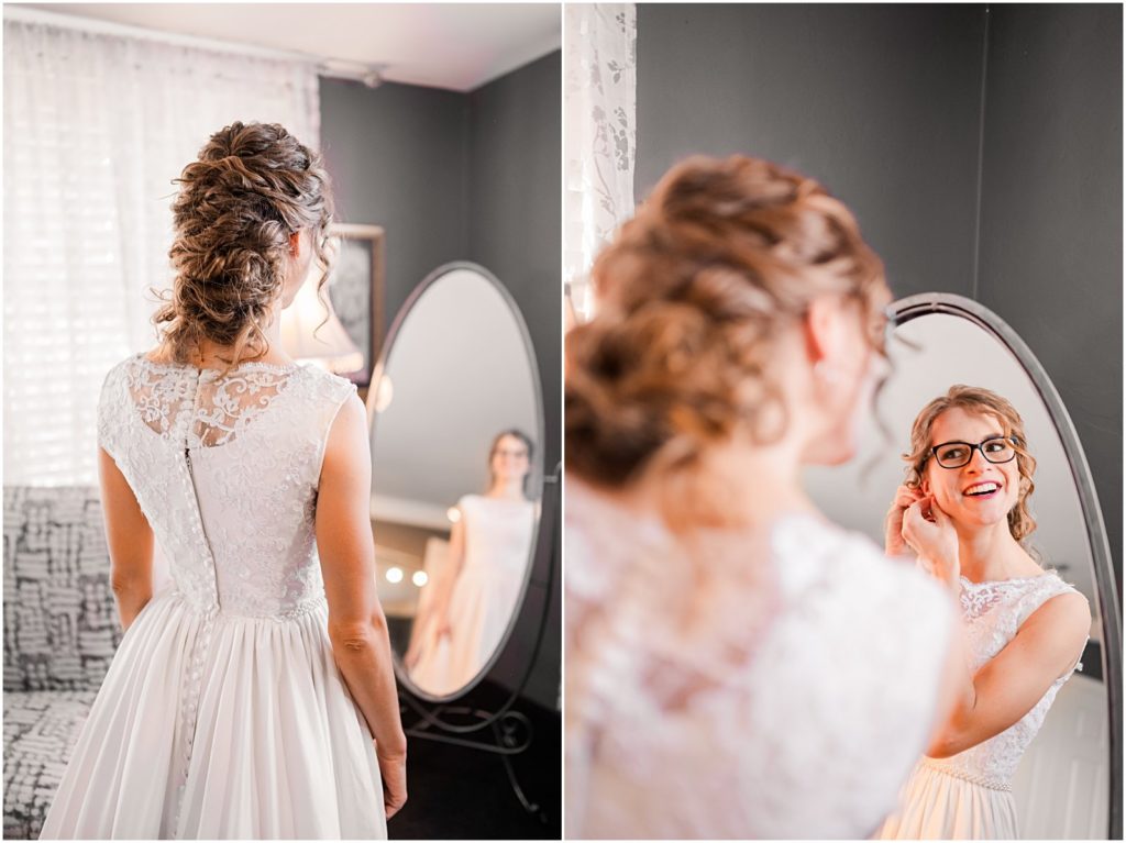 bride getting ready indoors in front of mirror