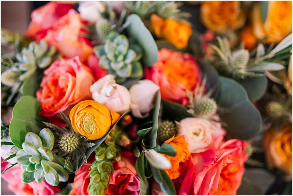 colorful coral and orange desert bridal bouquet