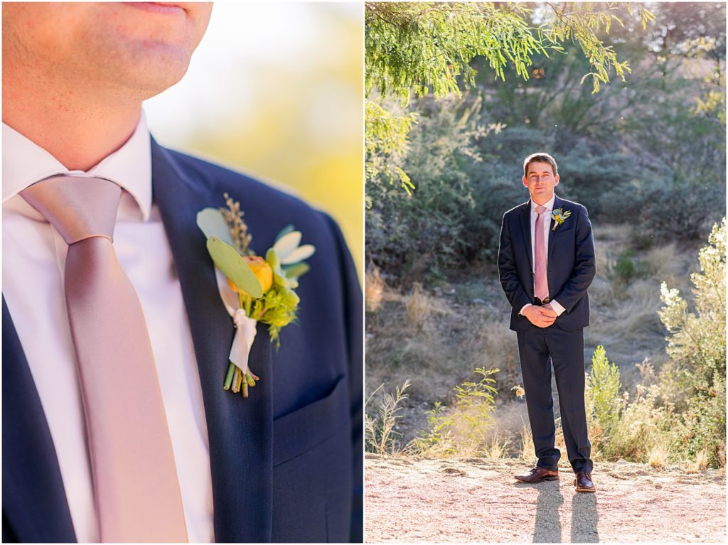 groom in navy suit with pink tie and yellow boutonniere