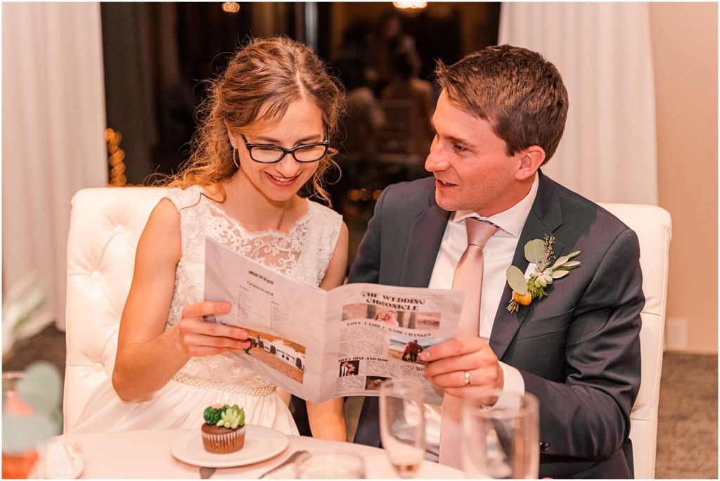 bride and groom read custom wedding day magazine
