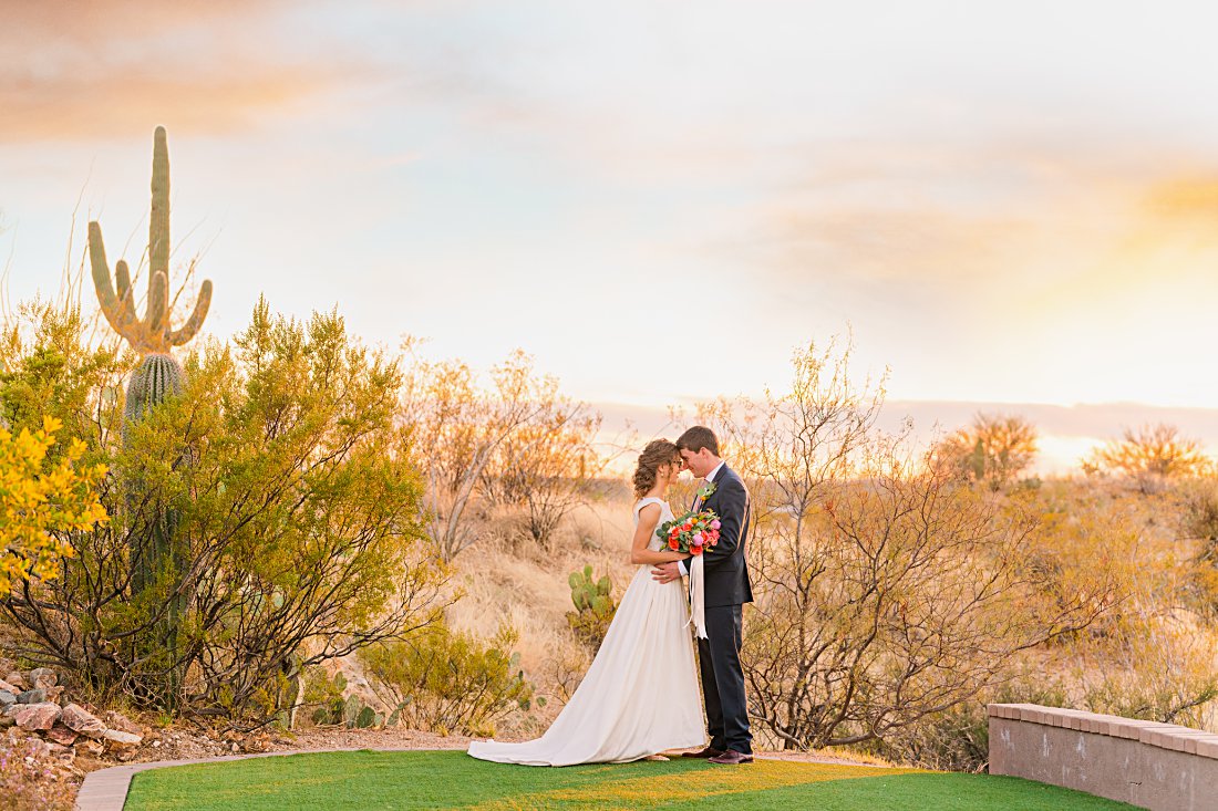 bride and groom portrait at sunset at winter Saguaro Buttes wedding