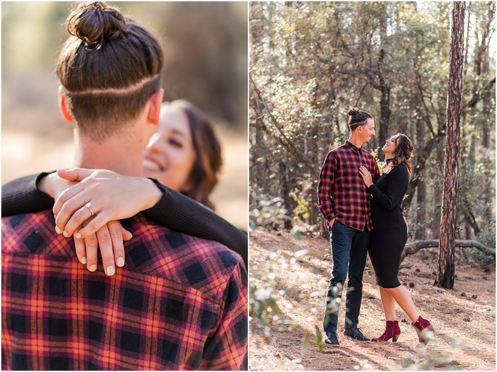 couple smiling at each other during engagement session