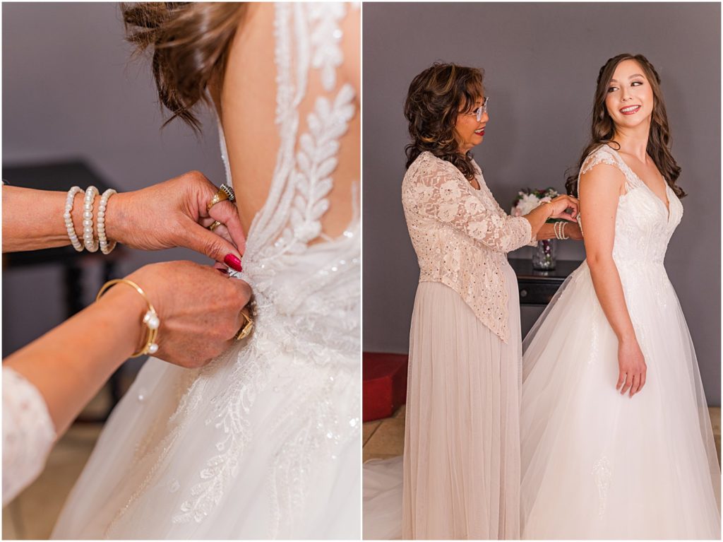 mom helping bride get into her wedding dress