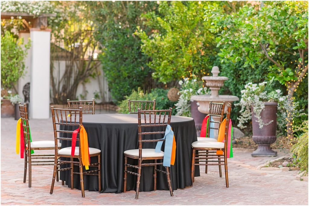 colorful accents on reception chairs at fiesta wedding