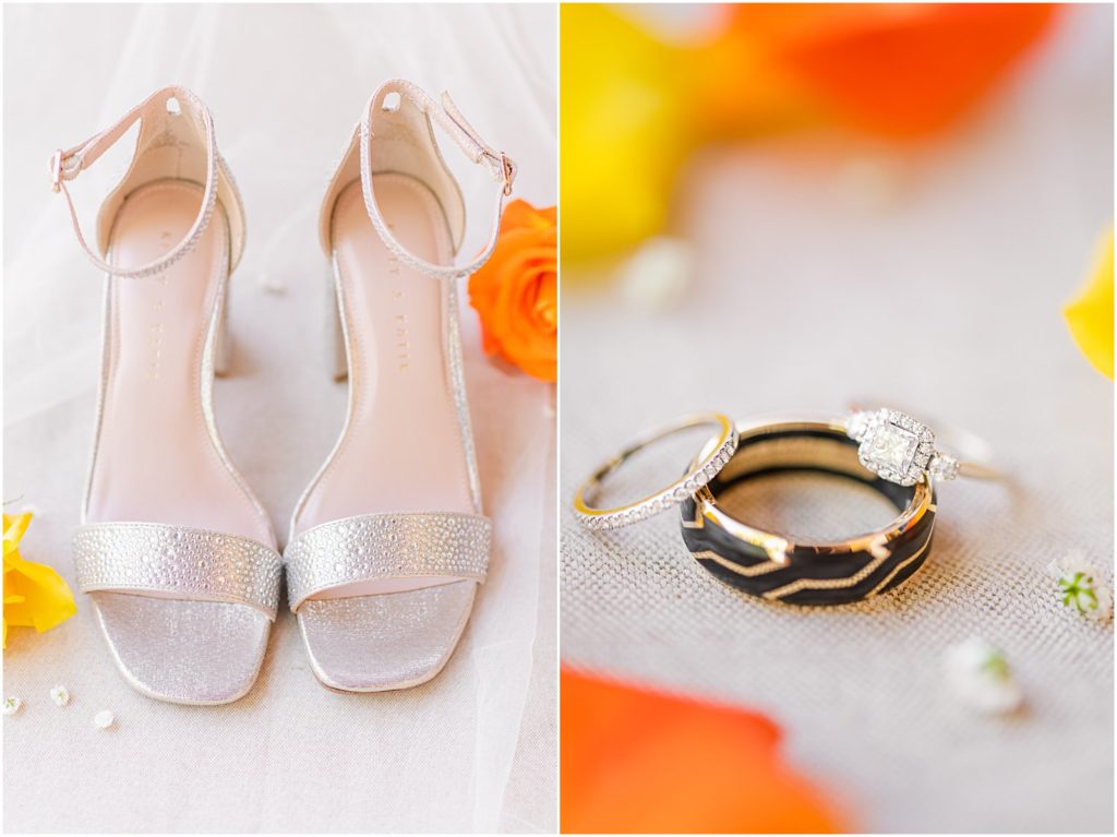 bride's shows and wedding rings with orange and yellow flower petals