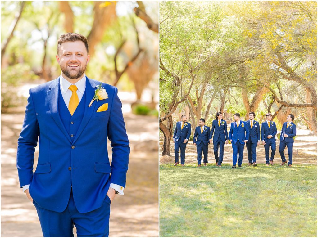 groom walking with groomsmen laughing in matching navy suits
