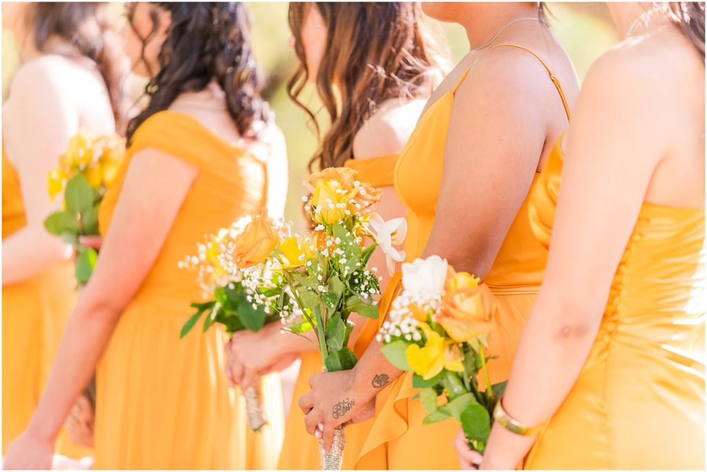 bridesmaids standing together during wedding ceremony