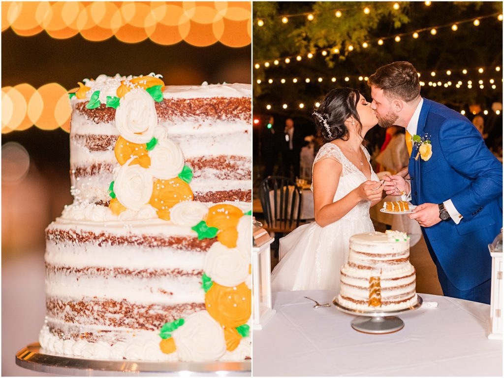 bride and groom kiss behind wedding cake after cutting it together