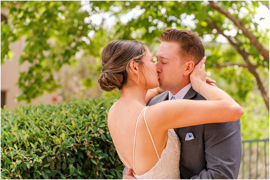 bride and groom kissing after First Look together at The Ridge hotel
