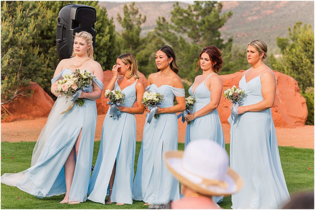 bridesmaid tearing up during reading of personal wedding vows