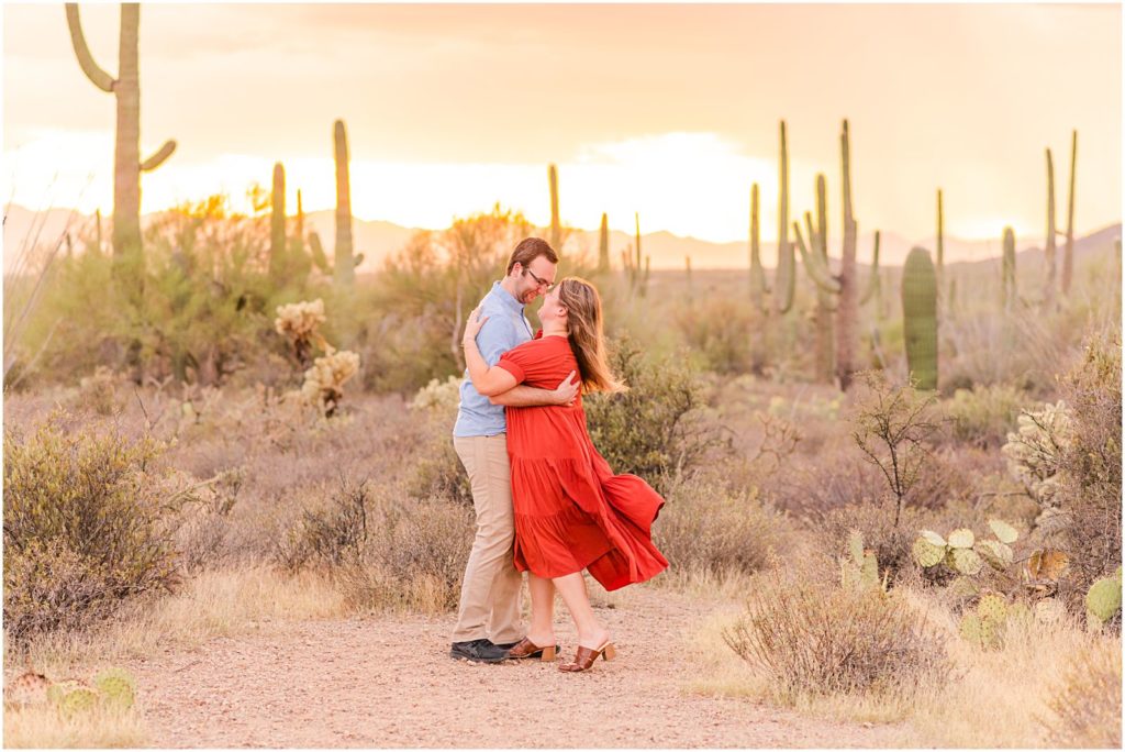 engaged couple dancing together during destination engagement session in Tucson