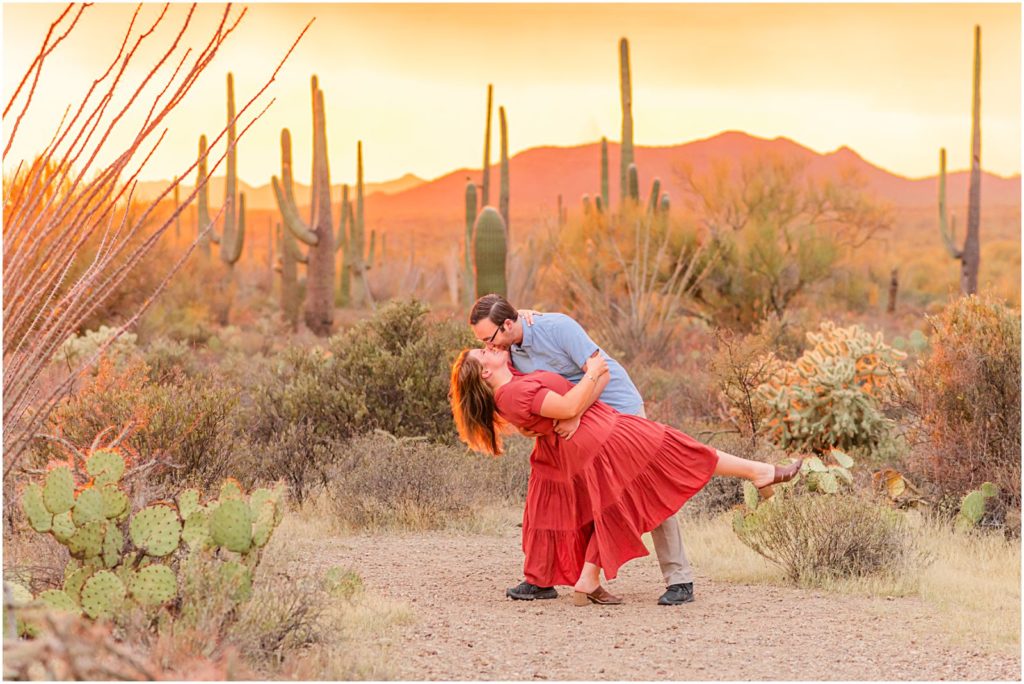 engaged couple romantic dip and kiss during Tucson engagement session