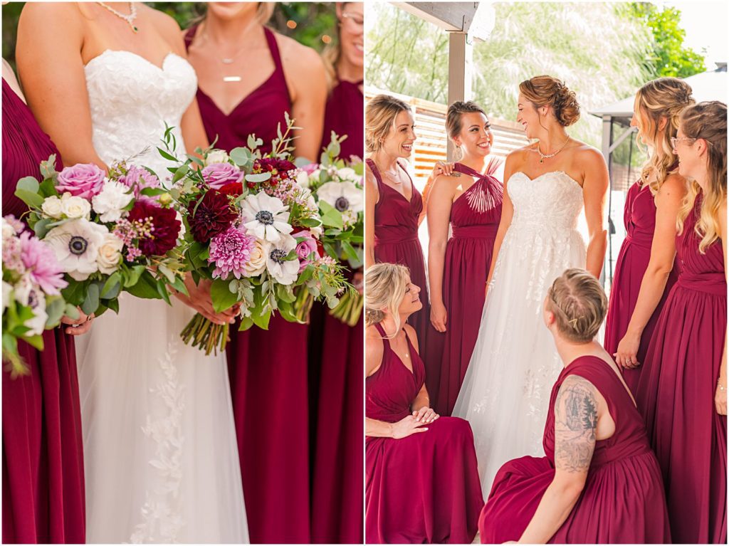 bridesmaids in burgundy dresses surrounding bride