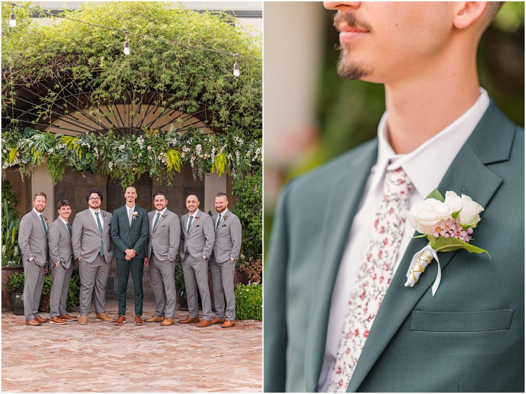 groom in emerald suit with groomsmen in grey suits