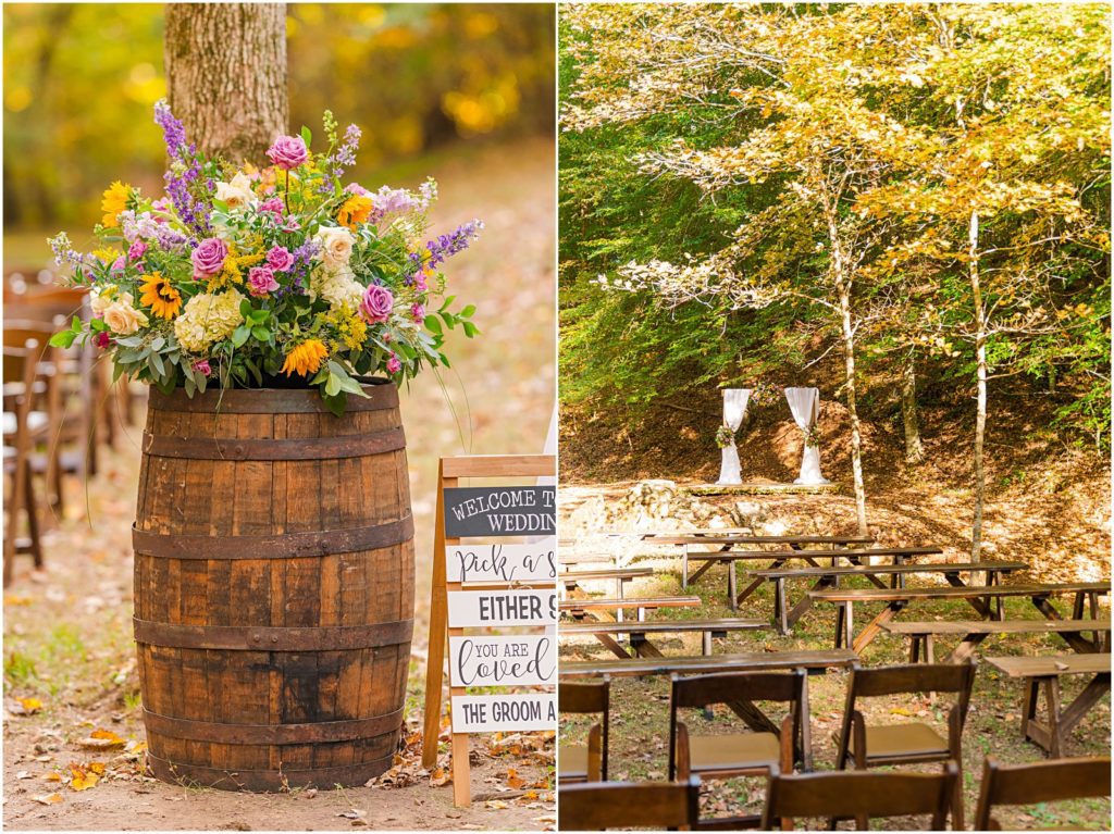 rustic barrel with flowers at wedding ceremony entrance