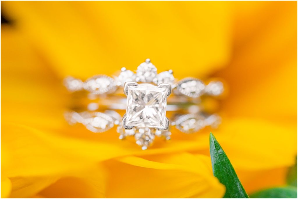 wedding rings upclose on sunflower petals