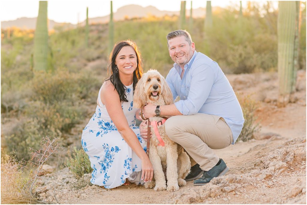 engagement photos with pet dog Irish doodle in desert
