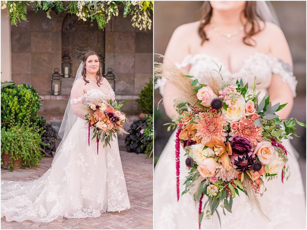 portrait of bride holding her bouquet in stone courtyard