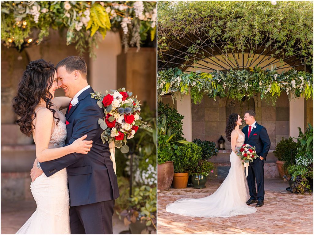 pulled back portrait of bride and groom under arbor covered in greenery in courtyard