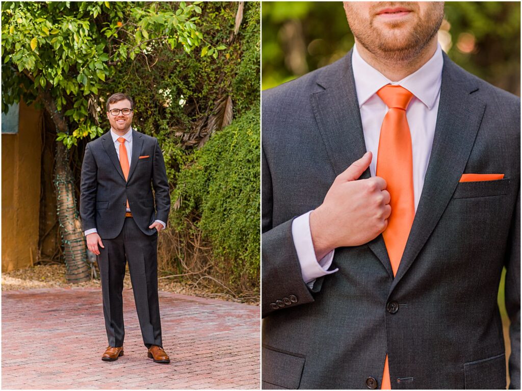 groom wearing gray suit with bright orange tie