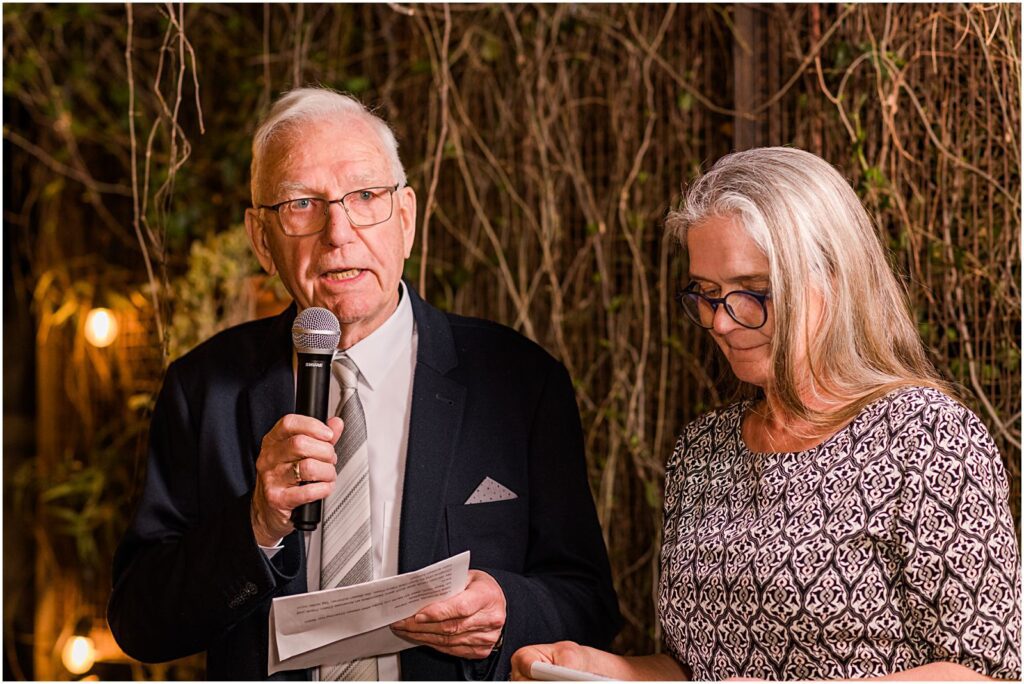 grandfather giving speech in German at wedding
