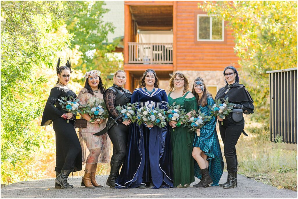 bride and her bridesmaids in costume at fantasy inspired wedding