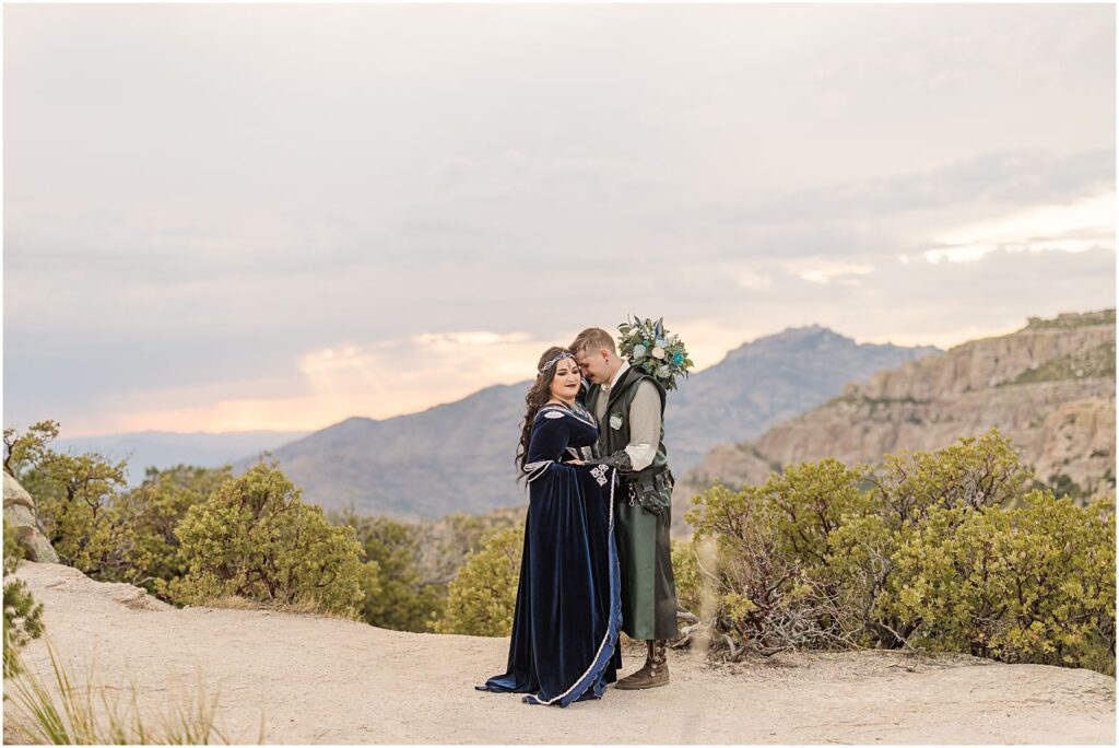 mountain views during husband and wife portraits at sunset
