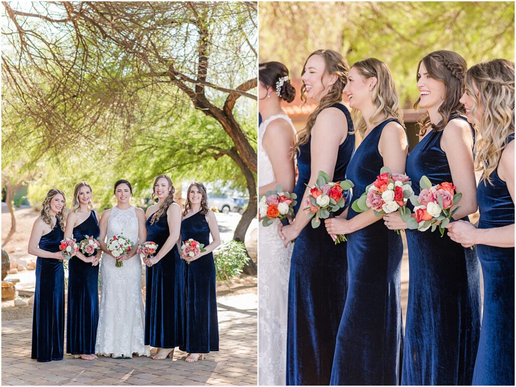 bride with her bridesmaids in navy velvet dresses
